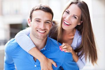couple hugging and smiling in melbourne fl