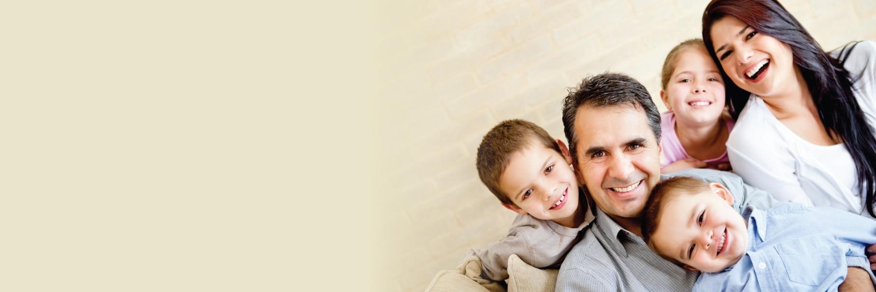 family of five smiling | Melbourne Family Dentist